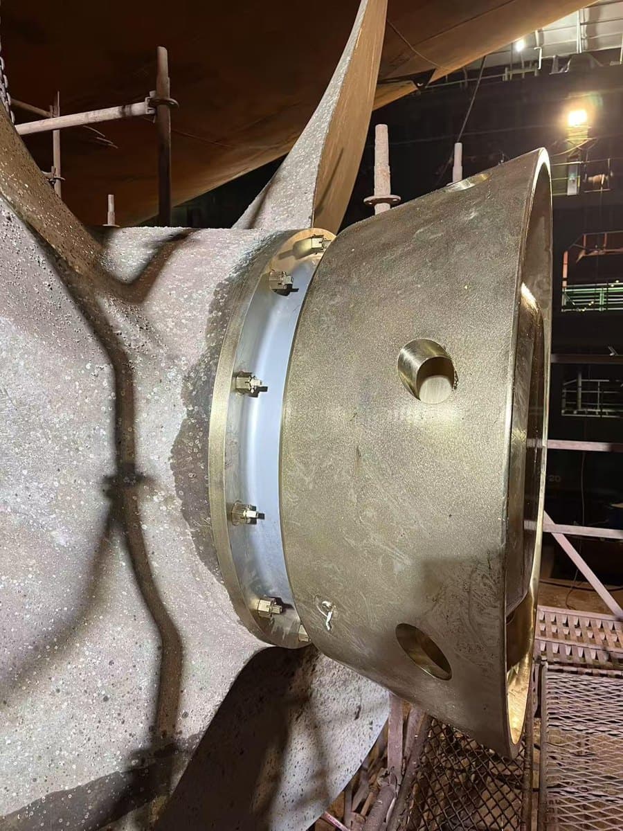 Bronze Eco Boss Cap close-up showing a pressure-relief hole